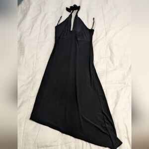 5 7 9 little black asymmetrical dress with a v-neck and ties at the neck size XS